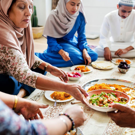 An immigrant family sharing a meal