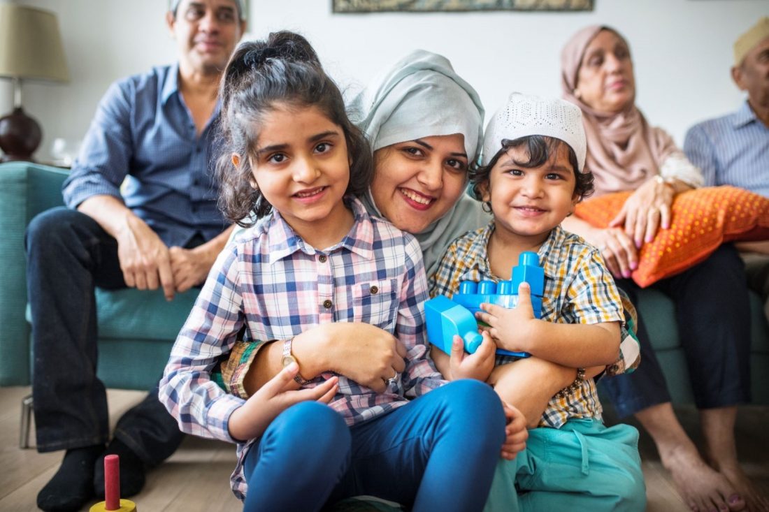 A refugee mother with her two children